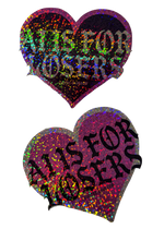 AI Is for Losers heart stickers in pink and black glitter, angled to show the holographic sparkle