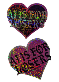 AI Is for Losers heart stickers in pink and black glitter, angled to show the holographic sparkle