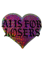 Pink holographic glitter heart sticker reading "AI Is for Losers" in black gothic letters