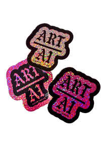 Three Art Over AI glitter stickers in silver, pink and black, each with black gothic lettering and a thick black border
