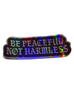 be peaceful not harmless sticker in holographic silver
