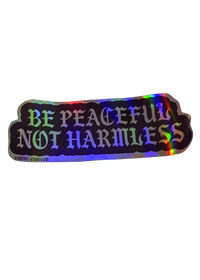 be peaceful not harmless sticker in holographic silver
