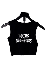 Boobs Not Bombs free Palestine tank on a hanger, black cropped tank with white gothic print