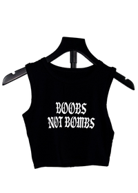 Boobs Not Bombs free Palestine tank on a hanger, black cropped tank with white gothic print