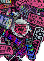 Round white Cuntry Club logo sticker with a hot pink screaming cat face on a pile of pink and holographic stickers