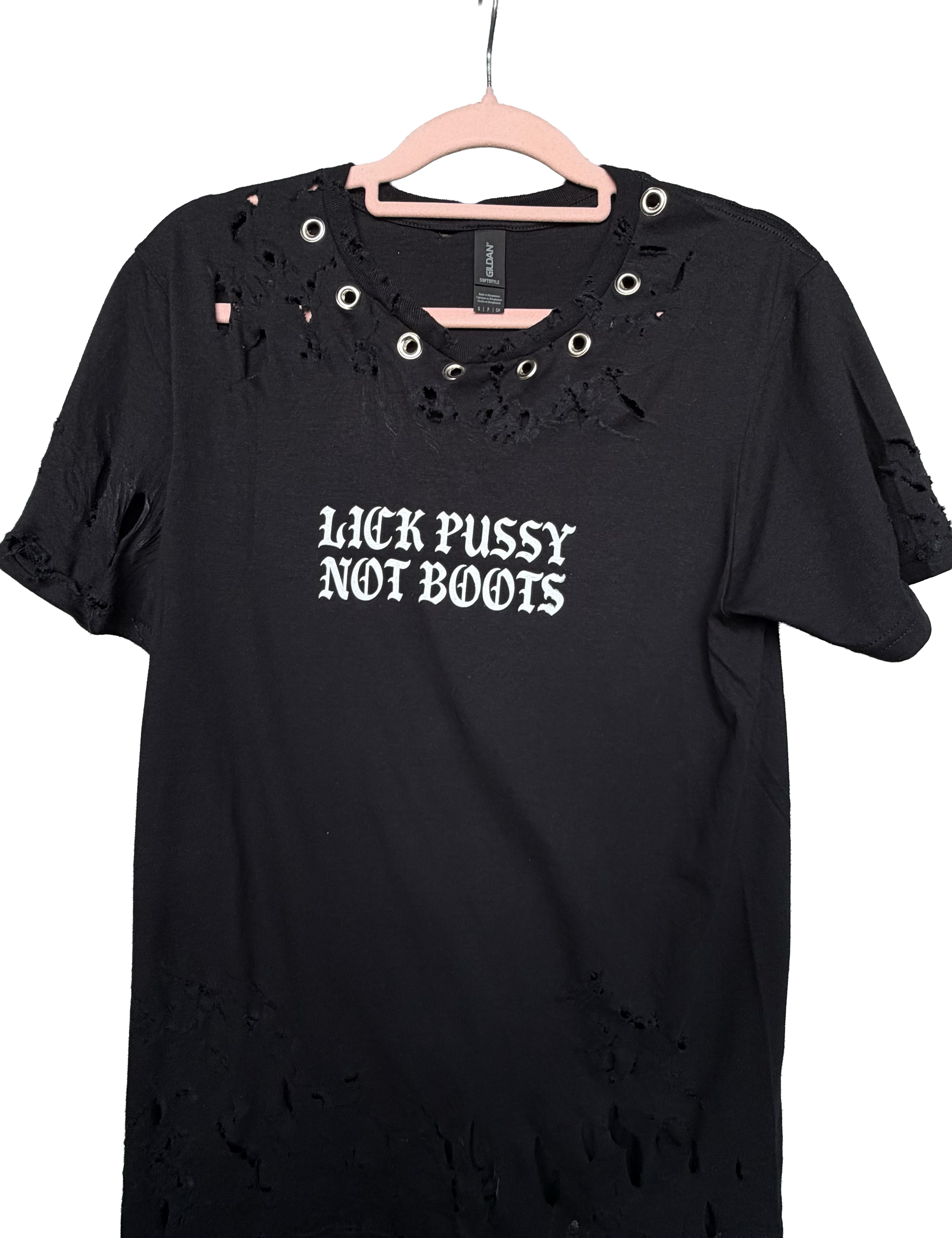 Black t-shirt with text on a hanger against a white background
