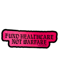 Pink Fund Healthcare Not Warfare sticker with black gothic lettering and a black border