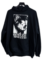 Gouge Out Your Eyes trans rights hoodie on a hanger, black with a distressed face graphic under "Don't want to see trans people?"