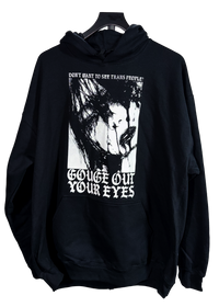 Gouge Out Your Eyes trans rights hoodie on a hanger, black with a distressed face graphic under "Don't want to see trans people?"