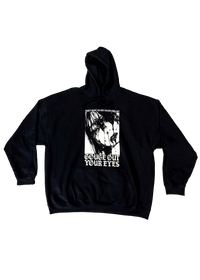 Black hoodie laid flat with a large black and white print of a face with dark streaks running from the eyes and "Gouge Out Your Eyes" in gothic letters