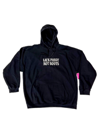 Black hoodie laid flat with "Lick Pussy Not Boots" in white gothic letters across the chest and a pink hangtag on the side