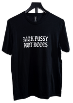 Lick Pussy Not Boots pro choice t-shirt on a hanger, black with a white gothic chest print