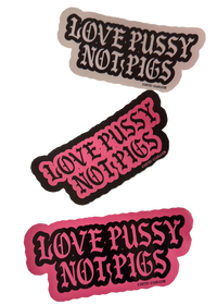 Three Love Pussy Not Pigs anti police stickers in white, black and pink, each with gothic lettering