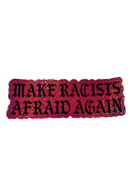 Pink glitter Make Racists Afraid Again sticker with black gothic lettering