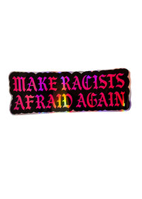 A rectangular sticker with a black background and the phrase 'MAKE RACISTS AFRAID AGAIN' in large, colorful gothic-style letters that shift through pink, purple, orange, yellow, and green, set against a plain white background.