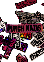Three XL Punch Nazis anti racism stickers in silver, pink and rose glitter with bold black lettering